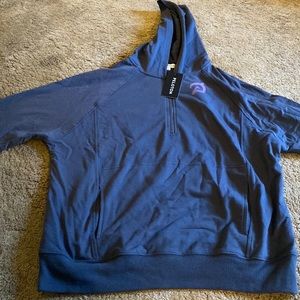 Brand new Peloton top! Very nice and a thinner cotton material!